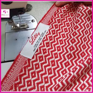 Hamamdoek met logo label in tasje met opdruk
